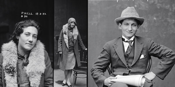Two black-and-white images featured side by side: A woman in a fur shawl standing next to a chair, and a man, sitting in a chair and holding a newspaper, wearing a suit and top hat. 
