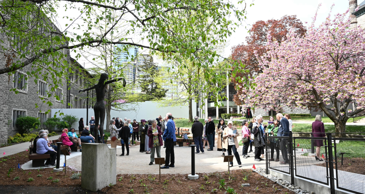 Alumni gather in the Emmanuel College Indigenous Healing Garden.