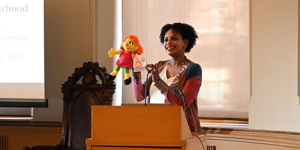 Photo: Dr. Rhonda McEwen presents Julia to attendees of a Victoria Women's Association lecture in November, 2022.