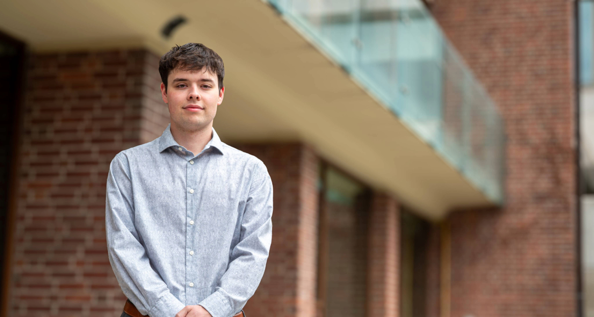 Shane Joy standing in front of the Goldring Student Centre.